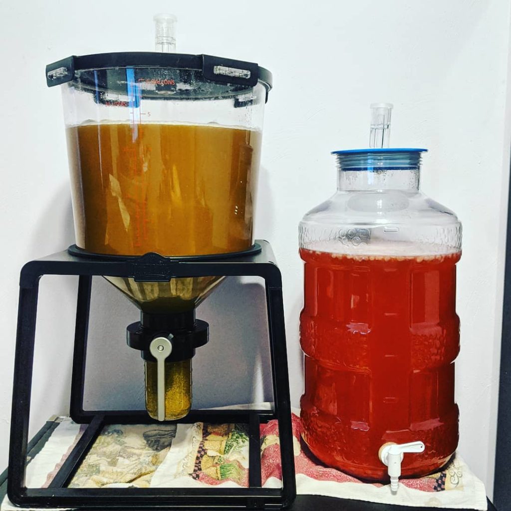 A plastic Catalyst Conical Fermenter and a plastic Big Mouth Bubbler to illustrate the difference between glass vs plastic vs stainless steel homebrewing fermenters